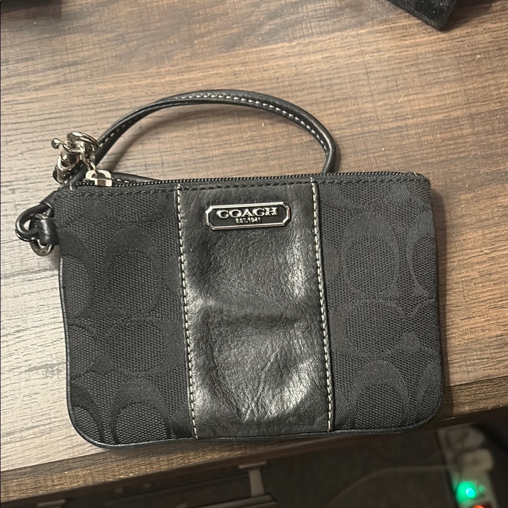 Coach Black Clutch with Wrist Strap and Metallic Hardware